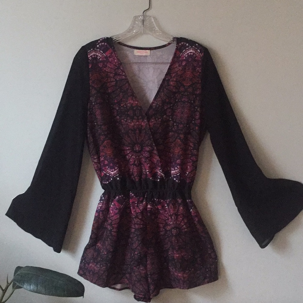 Boho bell sleeved romper.